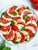 Caprese Salad-Fresh Mozzarella, Tomato & Basil Drizzled w/ Olive Oil, Balsamic & Coarse Pepper platter