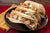 24 Tacos-Soft Tacos Seasoned Shrimp, Cheese, peppers, gr. onion, cilantro